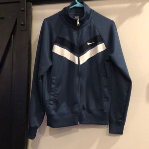 A Nike zip up lightweight jacket